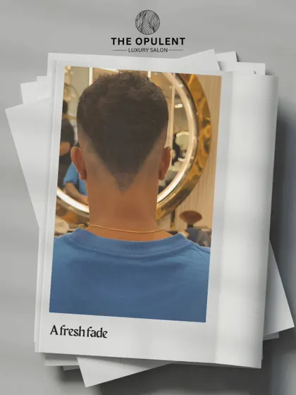 The back view of this precision V-shaped fade. It's all about the clean lines and sharp details that elevate a standard cut to something special.