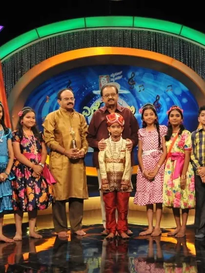 A duplicate of image 11, sharing the stage with musical legends as a child was an incredible learning experience that I will always cherish.