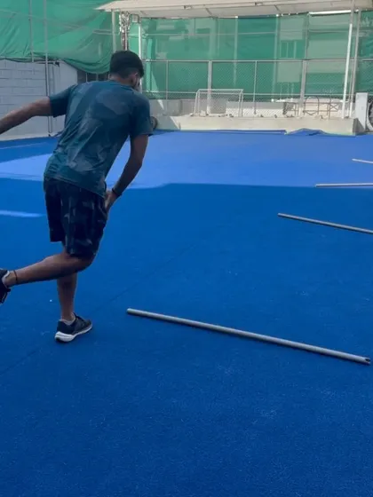This image shows an athlete performing a single-leg hop, a plyometric drill designed to improve power and stability. We use these exercises to translate strength gains into explosive on-field performance.