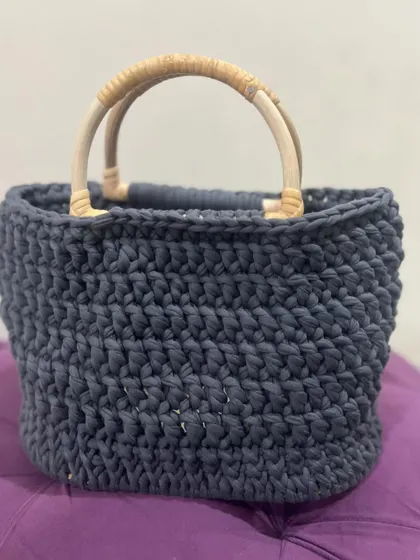 The grey T-shirt yarn bag is a perfect neutral accessory that goes with almost any outfit.
