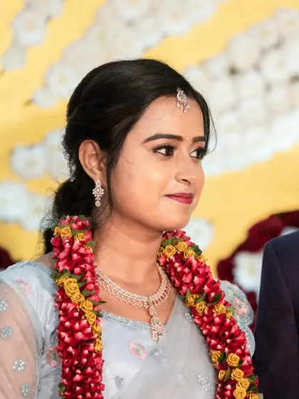 The final look for Shilpa's reception. A soft, romantic makeup style with a touch of shimmer on the eyes, perfect for an evening of celebration.