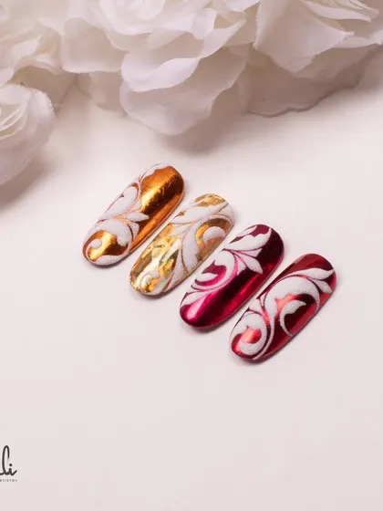 A beautiful shot of my swirl designs on a foil base. The combination of textures and finishes makes these nails truly special.