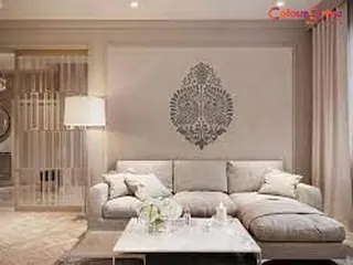 This 'Venetian Peacock' lithos stencil creates a traditional and ornate centerpiece on the wall. It's an elegant choice for a formal living room, adding a touch of classic luxury.