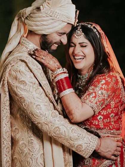 This is the kind of moment I live to capture. The unscripted, wholehearted laugh between two people who have found their home in each other. It's the pure, unfiltered joy that makes a wedding story timeless.