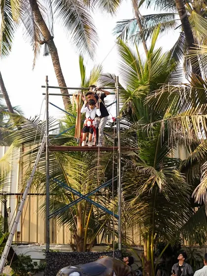 A high-angle view of our zip line tower, demonstrating the scale and professional setup of our adventure activities in a beautiful outdoor setting.
