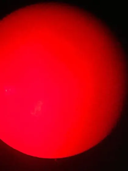 A view of the sun through a specially filtered telescope, part of our hands-on astronomy session for adult learners.