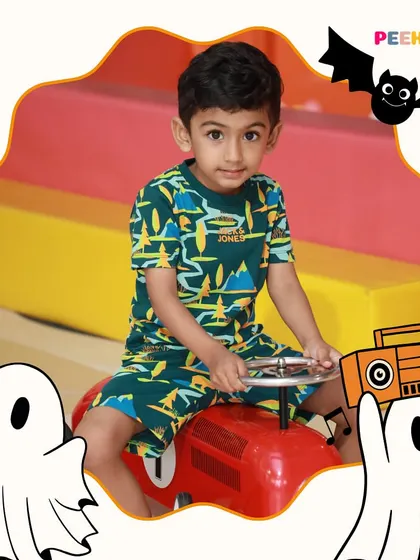 This little driver is ready for an adventure on one of our ride-on cars.
