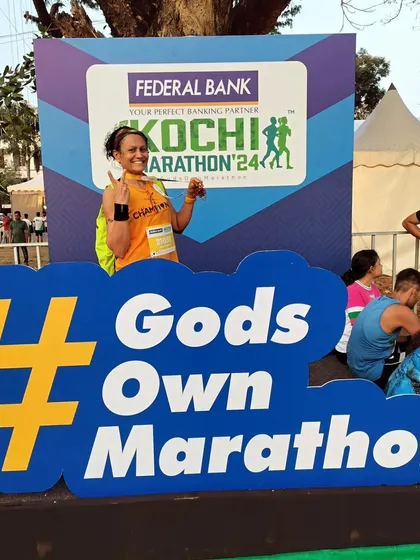 Celebrating at the "God's Own Marathon" photo point. It was a fantastic race experience in Kochi.