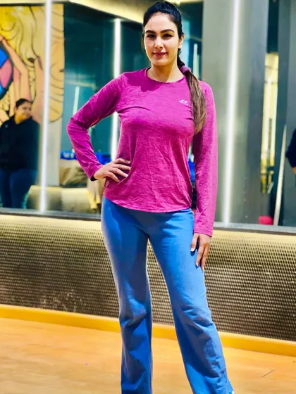 Ready for a class in my full-sleeve top and comfortable pants. It's important to wear what makes you feel good while you work out.