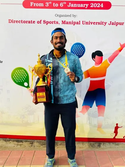 Oges celebrating his gold medal win at the All India Inter-University Championship, representing his university.