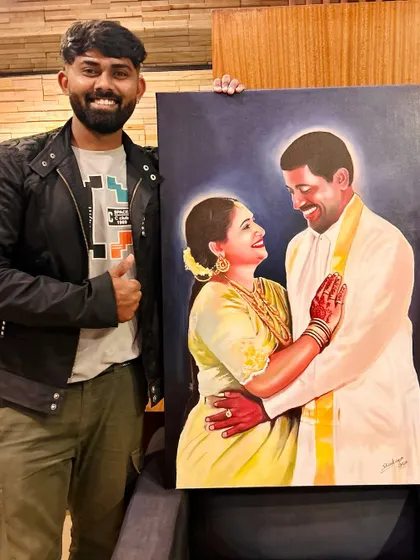 A proud moment with a completed acrylic couple portrait, showcasing the vibrant colors and happy emotions of the subjects.