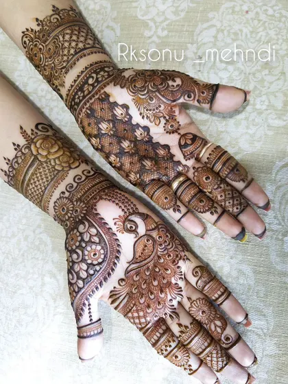 This gallery showcases a variety of my traditional designs. You'll find classic elements like peacocks, elephants, lotuses, and intricate jaali (net) patterns, all expertly crafted to create timeless beauty.