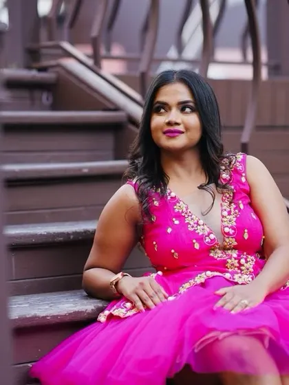 Another shot of the custom pink bachelorette dress. The asymmetrical hemline and detailed bodice make it a unique and memorable outfit.