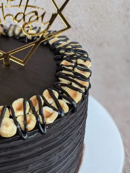 Another detailed shot of the Ferrero Rocher cake, focusing on the beautiful texture of the chocolate and hazelnuts.