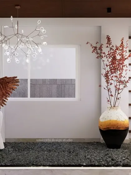 This courtyard is an emotional bridge between the polished indoors and the rugged outdoors. We used marble and wood to create an oasis, turning what could have been a 'dead space' into a cherished corner with adorable nooks for displaying art.