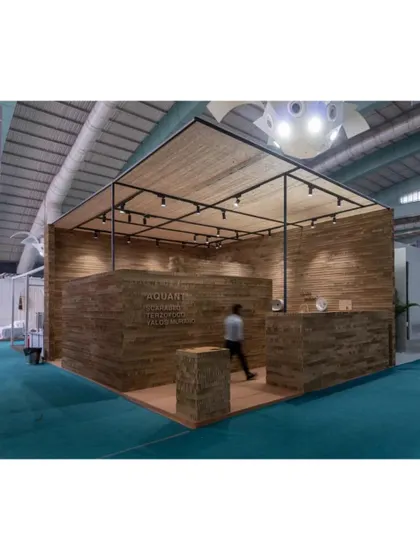 The Aquant Exhibition Stall by Design Work Group, a WAF shortlist for Display. This image shows the stall's complete form, constructed almost entirely from eco-friendly cardboard, creating a warm, textured, and sustainable space.