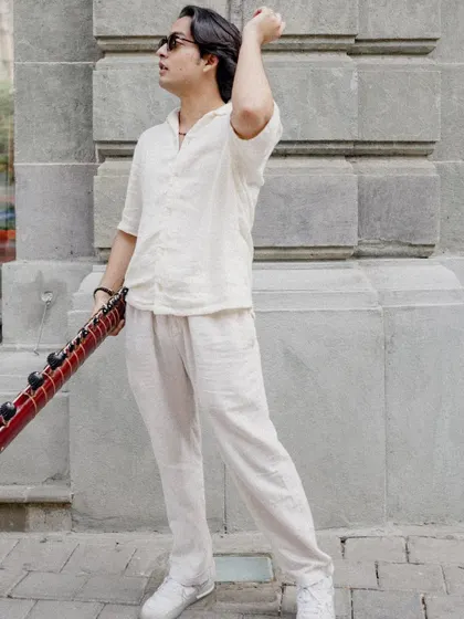 A full-length shot showing the complete outfit and vibe of the "Bones" video.