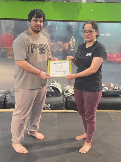 Another one of our "girl bosses" receiving her certificate. I am proud to train strong, capable women.