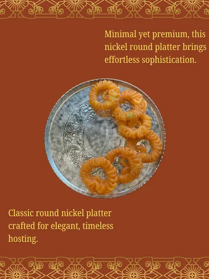Minimal yet premium, this classic round nickel platter brings effortless sophistication. It's crafted for elegant, timeless hosting, perfect for serving jalebis or other festive sweets.