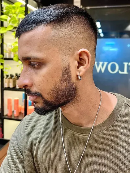 Another angle of the sharp skin fade, showing the clean lines and seamless blend.