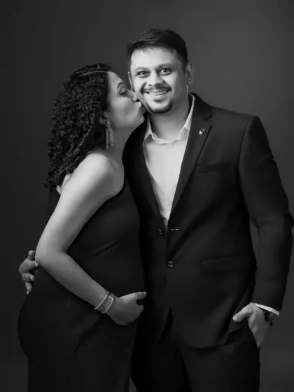 A duplicate of the playful and loving moment, preserving the genuine emotion in a classic format.