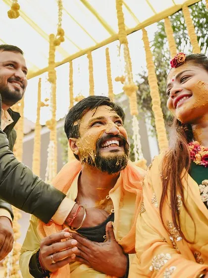 Friends and family joining in on the Haldi fun. I capture the interactions that make these ceremonies so special.