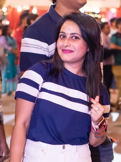 A happy guest in the crowd, enjoying the festive atmosphere.