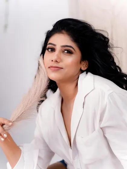 A soft and artistic portrait. The clean makeup look is versatile and photographs beautifully, allowing for creative and expressive shots like this one.