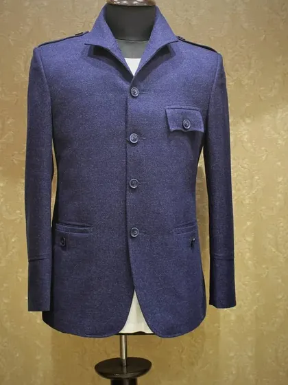 A glimpse of my suede blazer collection. This navy blue Jodhpuri or safari-style blazer is a versatile piece that can be dressed up for a formal event or worn for a smart casual look.