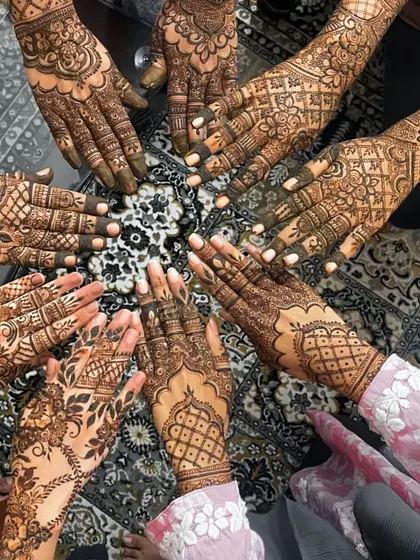 It's always fun to do henna for the entire bridal party. Here is a group shot showcasing a variety of guest and party mehndi designs, each one unique to the person wearing it.
