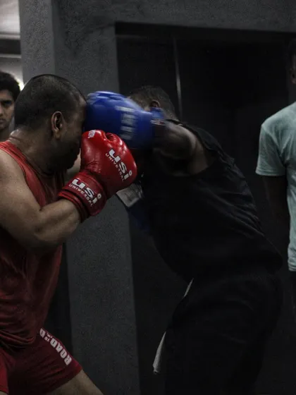 An intense moment of inside fighting. This is about using leverage and short, powerful punches to control your opponent.