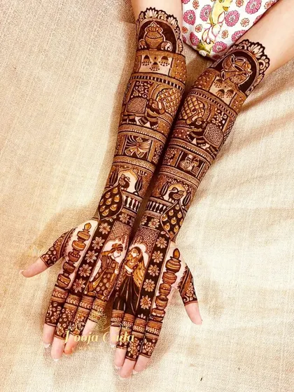Another view of the heavy bridal design with diya motifs, showcasing the intricate patterns and figures.