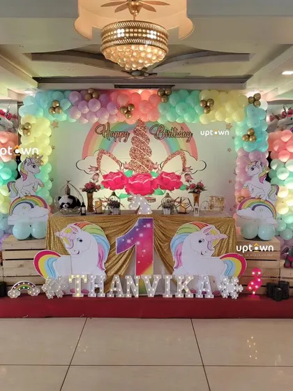 The full stage setup for the unicorn party.