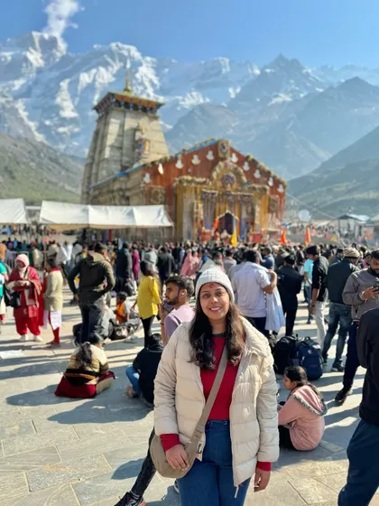 A client enjoying the morning sun at the Kedarnath temple complex. We ensure our itineraries give you enough time to soak in the atmosphere and create your own peaceful moments.