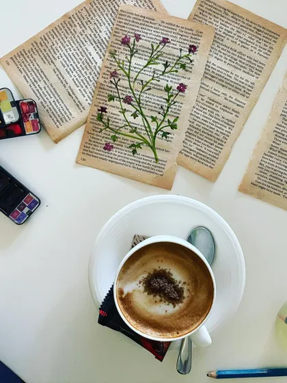 A quiet moment with coffee, sketching out ideas for my next series of embroideries on old book pages. Inspiration can come from anywhere, even the pages of a forgotten novel.