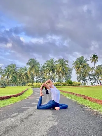 A graceful Eka Pada Rajakapotasana (One-Legged King Pigeon Pose). This pose is a dance of balance and grace, reminding us of the beauty in the present moment.
