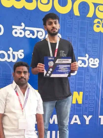 Another one of our dedicated students with his silver medal. We coach fighters across all age groups, helping them achieve their potential in the ring.