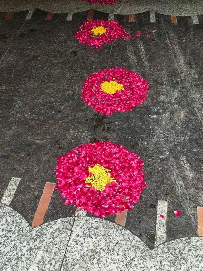 Simple and pretty flower petal rangoli designs for a baby welcome celebration.