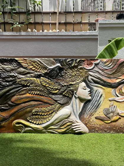 Another outdoor shot of the "Self Love" mural, showing the intricate details from a different angle.