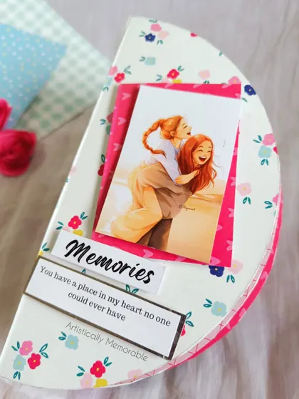 A beautifully styled shot of the semicircle 'Memories' album.