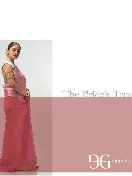 A full-length view of the 'Ashes of Roses' tissue saree, emphasizing its regal yet modern appeal. This piece is designed to be a treasured part of a bridal trousseau.