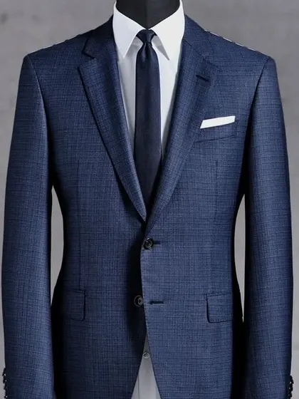 A classic navy blue suit jacket. The textured fabric adds a bit of interest to this wardrobe staple.