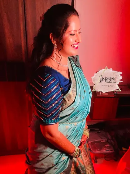 A happy bride during her Mehendi ceremony. I created a fun, vibrant look with a cut-crease eye to match the festive mood.