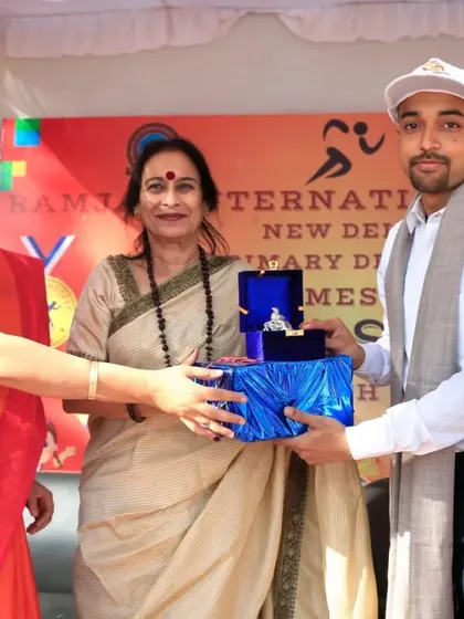 Receiving a token of appreciation from the administration of Ramjas International School. I am grateful for their warm hospitality and the opportunity to contribute to their event.