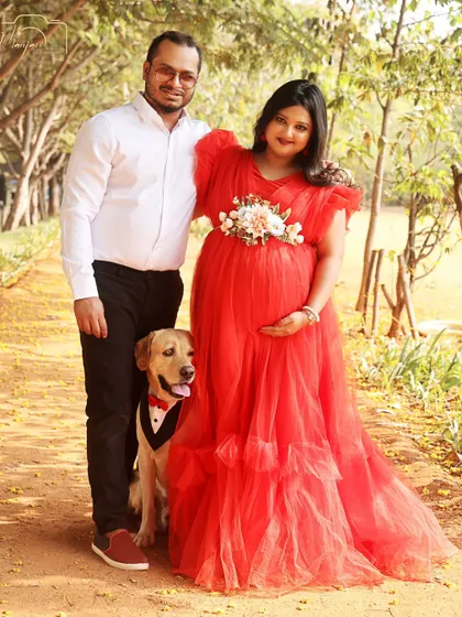 Another beautiful shot of the family with their furry friend. The love and connection between all of them is wonderful to see.