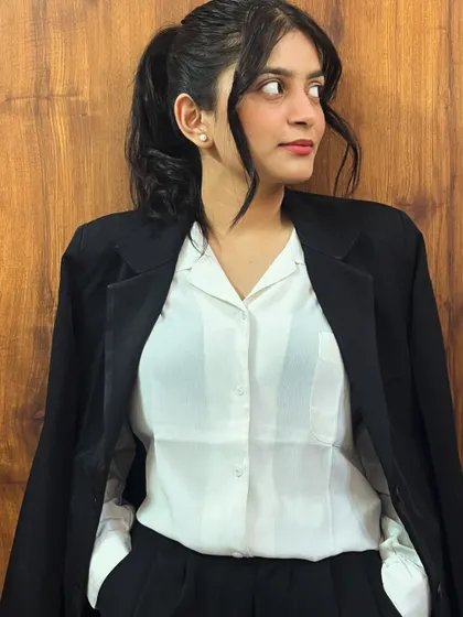 Serving looks and justice. I combine a modern style with a deep respect for the law, making me an effective advocate for my generation.