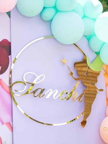This custom name sign for Sanchi's fairy-themed party was a beautiful, personalized detail. The gold acrylic and whimsical font, paired with pastel balloons, perfectly matched the soft and magical vibe of the celebration.