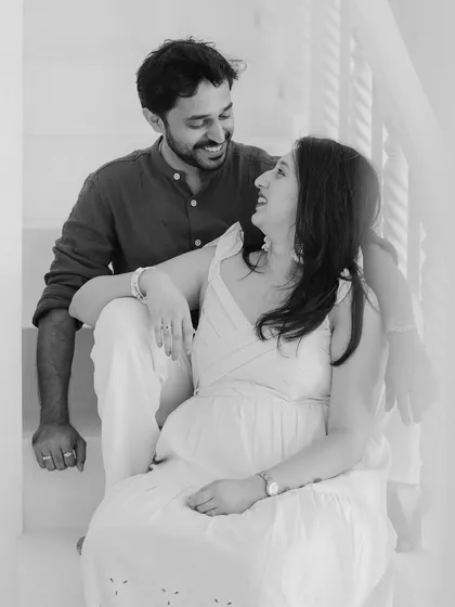 A light and airy black and white portrait of a couple, capturing their joyful connection.
