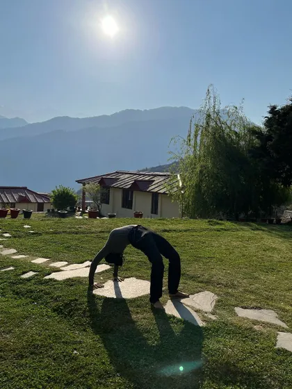 Opening my heart in Urdhva Dhanurasana, or wheel pose, under the Himalayan sun. This deep backbend is energizing and invigorating, a wonderful way to start the day before a trek.