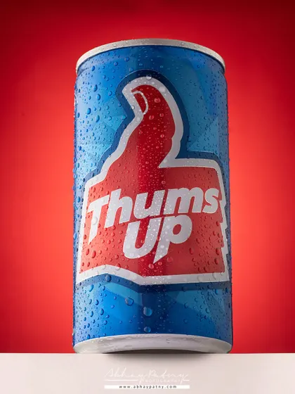 Capturing the perfect beverage shot is a science. Here, I used a complex lighting setup to highlight the can's shape and create those crisp, refreshing condensation droplets. This technique makes the drink look ice-cold and irresistible, which is crucial for beverage advertising.